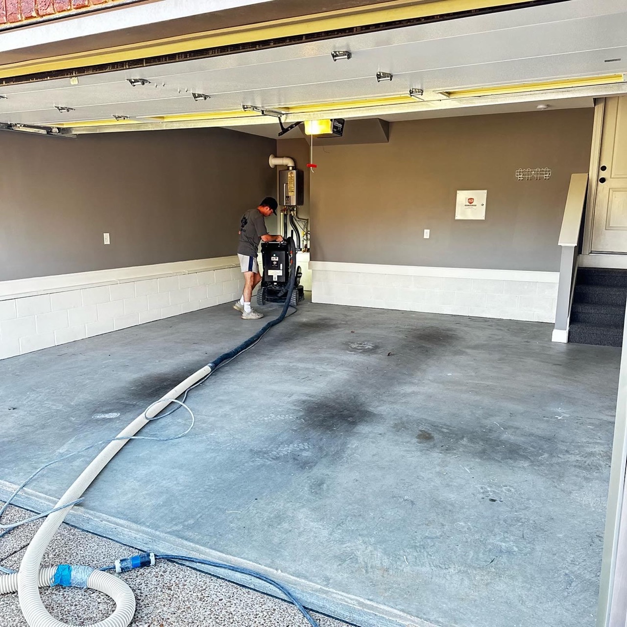 The same garage during concrete preparation before coating